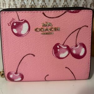 Coach snap on wallet in pink cherry